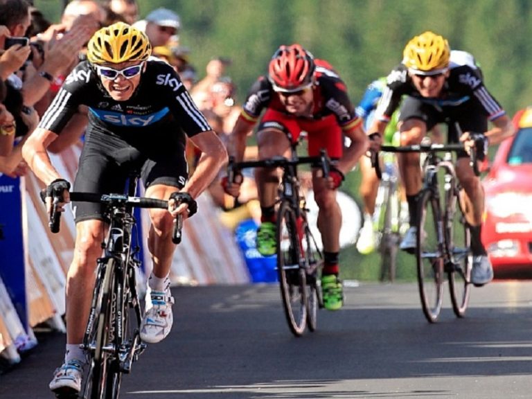 Team Sky rider Christopher Froome of Britain (L) sprints on the finish line ahead of BMC Racing Team rider Cadel Evans of Australia (C) and Team Sky rider Bradley Wiggins of Britain (R) at the end of the seventh stage of the 99th Tour de France cycling race between Tomblaine and La Planche des Belles Filles, July 7, 2012.       REUTERS/Jean-Paul Pelissier (FRANCE - Tags: SPORT CYCLING)